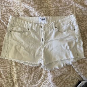 White Paige shorts with frayed hem